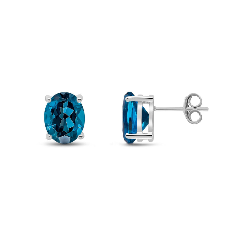 9ct White Gold Oval Natural London Blue Topaz Claw Stud Earrings — 9x7mm