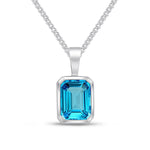 9ct White Gold Octagonal Natural Swiss Blue Topaz Rubover Pendant — 8x6mm