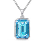 9ct White Gold Octagonal Natural Swiss Blue Topaz Rubover Pendant — 14x10mm