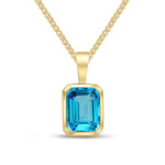 9ct Yellow Gold Octagonal Natural Swiss Blue Topaz Rubover Pendant — 8x6mm
