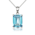 9ct White Gold Octagonal Natural Swiss Blue Topaz Claw Pendant — 14x10mm
