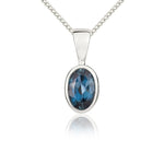 9ct White Gold Oval Natural London Blue Topaz Rubover Pendant — 6x4mm