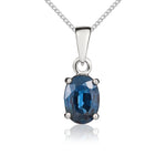 9ct White Gold Oval Blue Sapphire Claw Pendant — 7 × 5mm