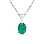 9ct White Gold Oval Natural Emerald Rubover Pendant — 7x5mm