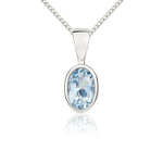 9ct White Gold Oval Natural Aquamarine Rubover Pendant — 6x4mm