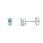9ct White Gold Oval Natural Swiss Blue Topaz Claw Stud Earrings — 5x3mm