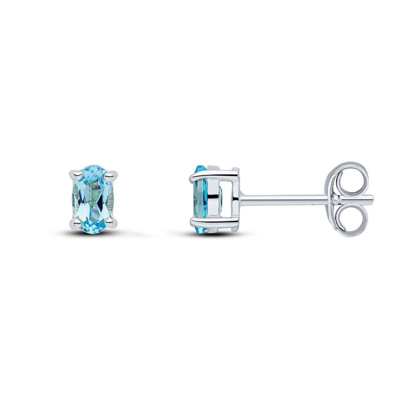 9ct White Gold Oval Natural Swiss Blue Topaz Claw Stud Earrings — 5x3mm