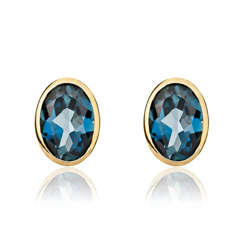 9ct Yellow Gold Oval Natural London Blue Topaz Rubover Stud Earrings — 7x5mm