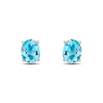 9ct White Gold Oval Natural Swiss Blue Topaz Claw Stud Earrings — 9x7mm