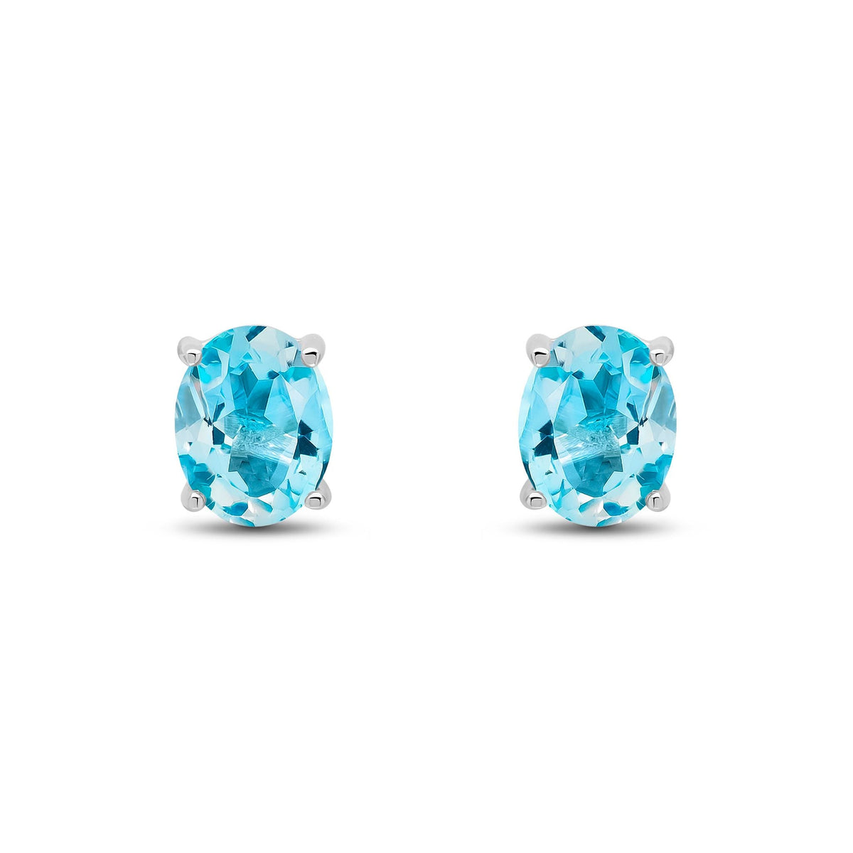 9ct White Gold Oval Natural Swiss Blue Topaz Claw Stud Earrings — 9x7mm