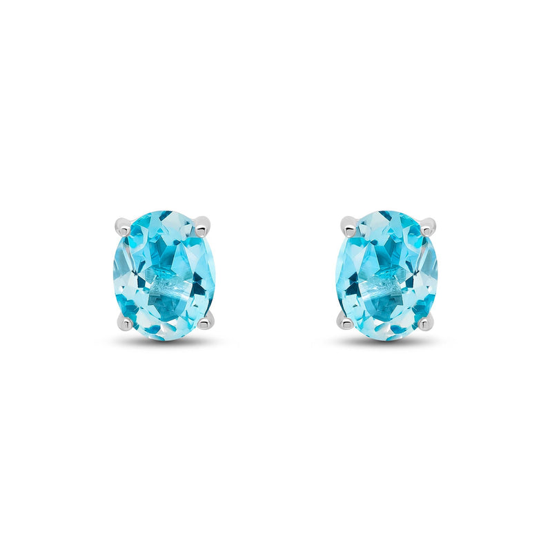 9ct White Gold Oval Natural Swiss Blue Topaz Claw Stud Earrings — 9x7mm