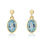 9ct Yellow Gold Oval Natural Swiss Blue Topaz Rubover Drop Earrings — 7x5mm