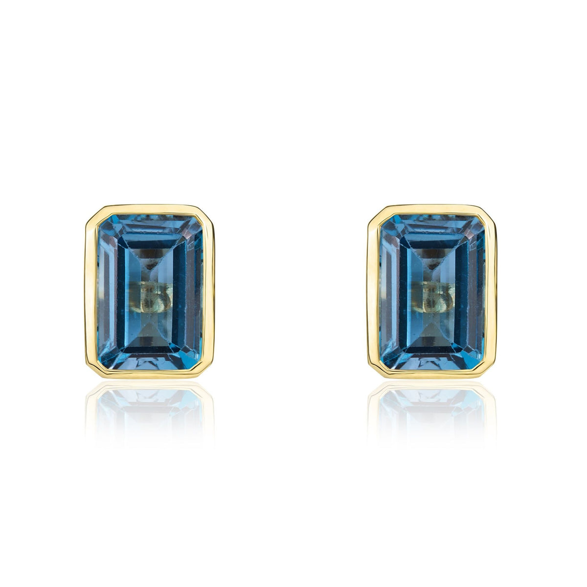 9ct Yellow Gold Octagonal Emerald Cut Natural London Blue Topaz Rubover Stud Earrings — 7x5mm