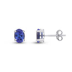 9ct White Gold Oval Natural Tanzanite Claw Stud Earrings — 7x5mm