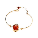 Gold Plated Sterling Silver Natural Baltic Amber Round Cabochon Bangle