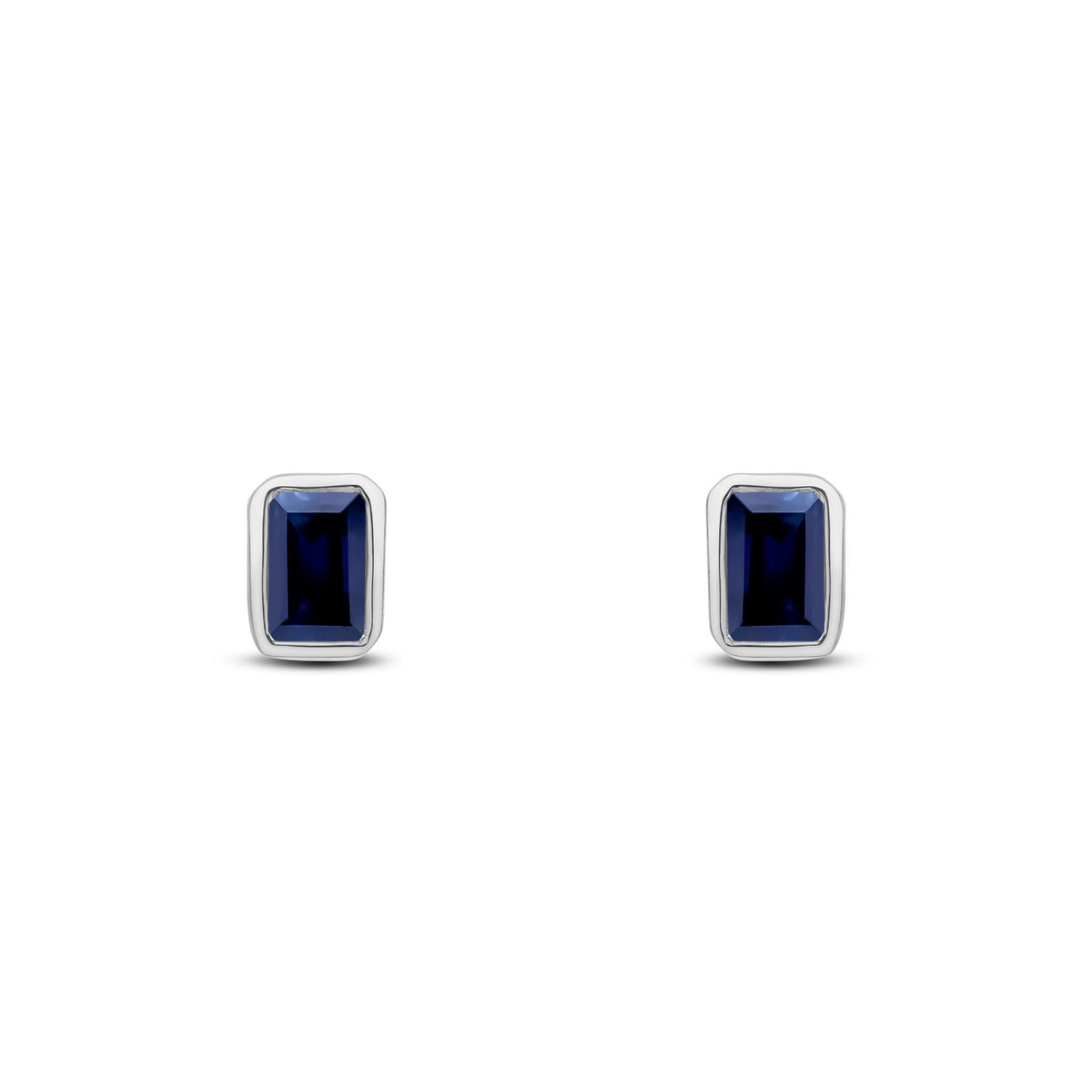 9ct White Gold Octagonal Emerald Cut Natural Sapphire Rubover Stud Earrings — 5x3mm
