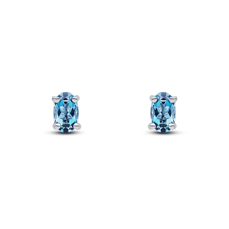9ct White Gold Oval Natural London Blue Topaz Claw Stud Earrings — 5x3mm