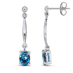 9ct White Gold Oval Natural London Blue Topaz Claw Bar Drop Earrings — 7x5mm