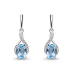 9ct White Gold Oval Natural Swiss Blue Topaz & Diamond Crossover Drop Earrings — 6x4mm