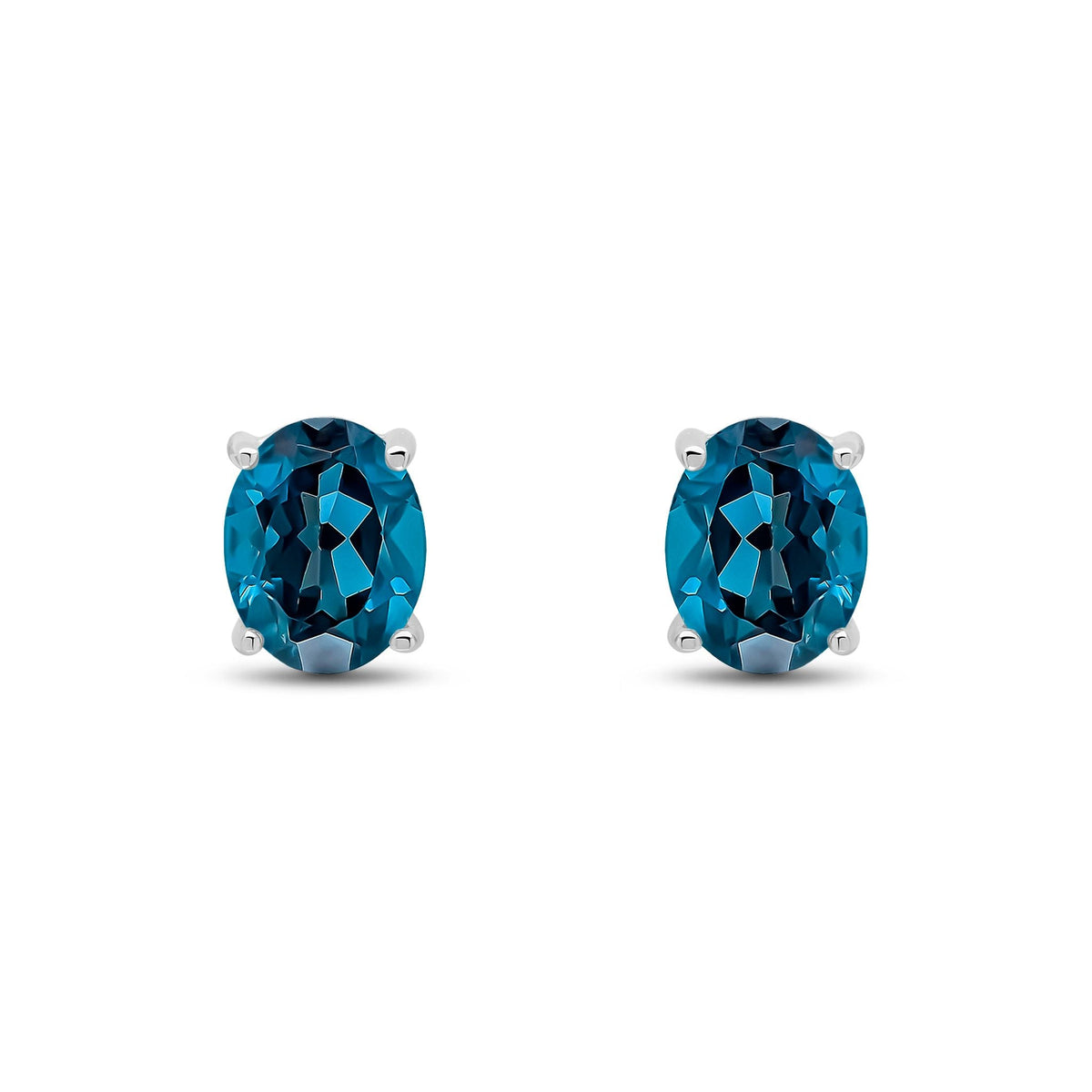 9ct White Gold Oval Natural London Blue Topaz Claw Stud Earrings — 9x7mm