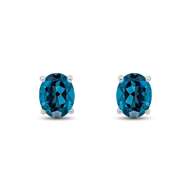 9ct White Gold Oval Natural London Blue Topaz Claw Stud Earrings — 9x7mm