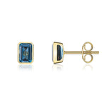 9ct Yellow Gold Octagonal Emerald Cut Natural London Blue Topaz Rubover Stud Earrings — 7x5mm