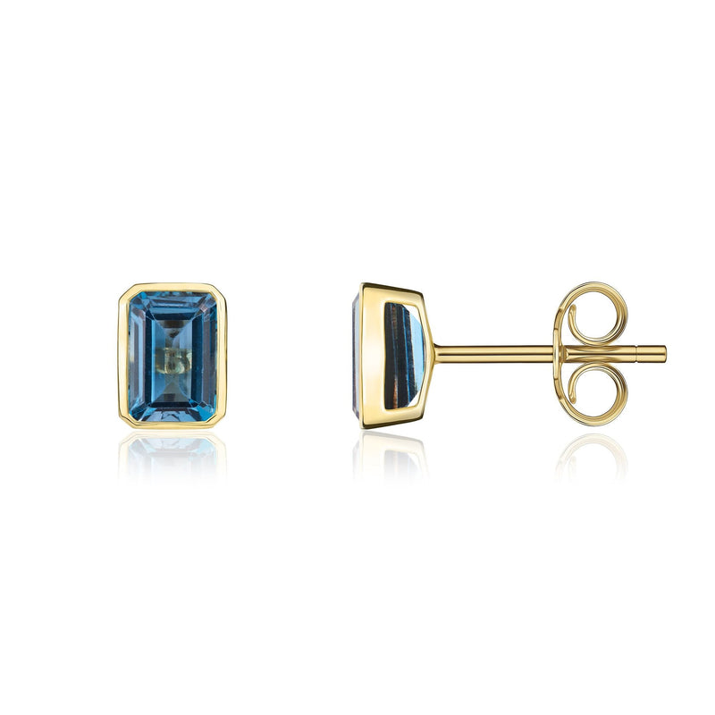 9ct Yellow Gold Octagonal Emerald Cut Natural London Blue Topaz Rubover Stud Earrings — 7x5mm