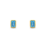 9ct Yellow Gold Octagonal Emerald Cut Natural Swiss Blue Topaz Rubover Stud Earrings — 5x3mm