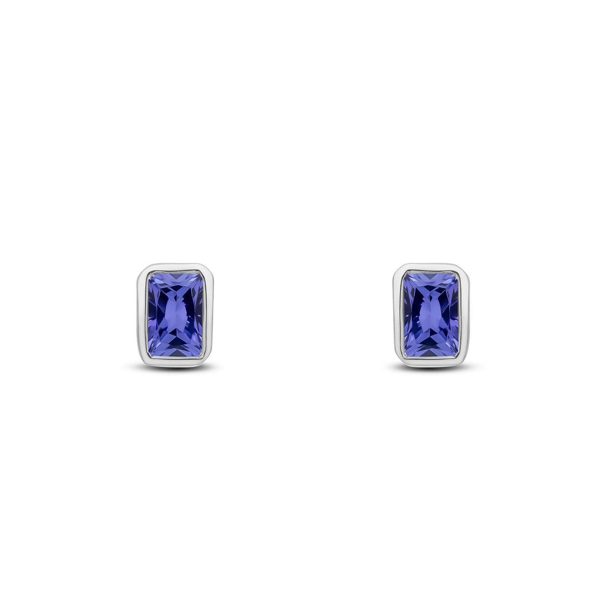 9ct White Gold Octagonal Emerald Cut Natural Tanzanite Rubover Stud Earrings — 5x3mm