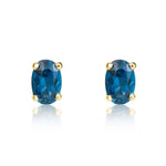 9ct Yellow Gold Oval Natural London Blue Topaz Claw Stud Earrings — 6x4mm