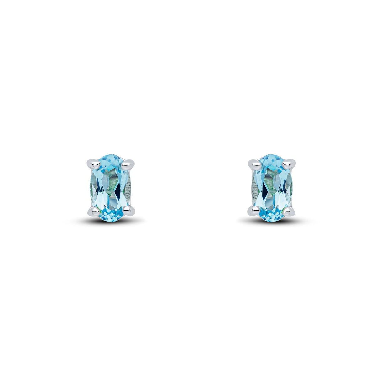 9ct White Gold Oval Natural Swiss Blue Topaz Claw Stud Earrings — 5x3mm
