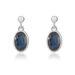 9ct White Gold Oval Natural Sapphire Rubover Drop Earrings — 6x4mm