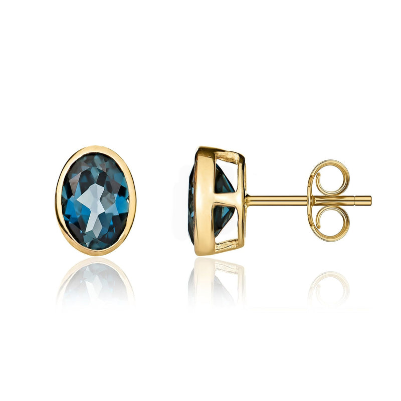 9ct Yellow Gold Oval Natural London Blue Topaz Rubover Stud Earrings — 7x5mm
