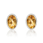 9ct White Gold Oval Natural Citrine Rubover Stud Earrings — 7x5mm