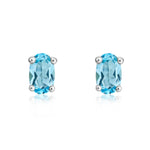 9ct White Gold Oval Natural Swiss Blue Topaz Claw Set Earrings — 6x4mm
