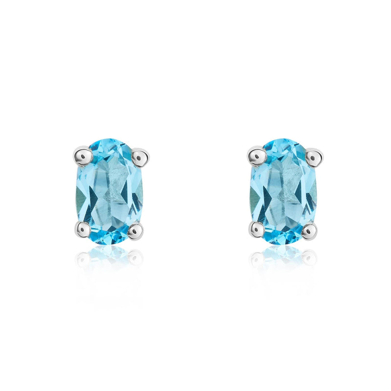9ct White Gold Oval Natural Swiss Blue Topaz Claw Set Earrings — 6x4mm