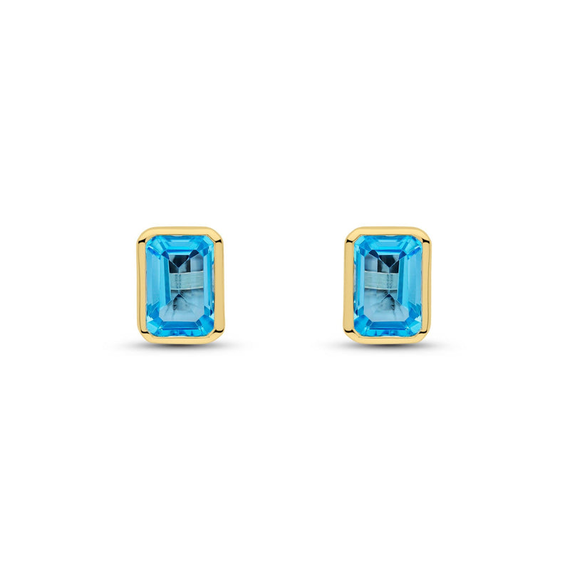 9ct Yellow Gold Octagonal Emerald Cut Natural Swiss Blue Topaz Rubover Stud Earrings — 7x5mm