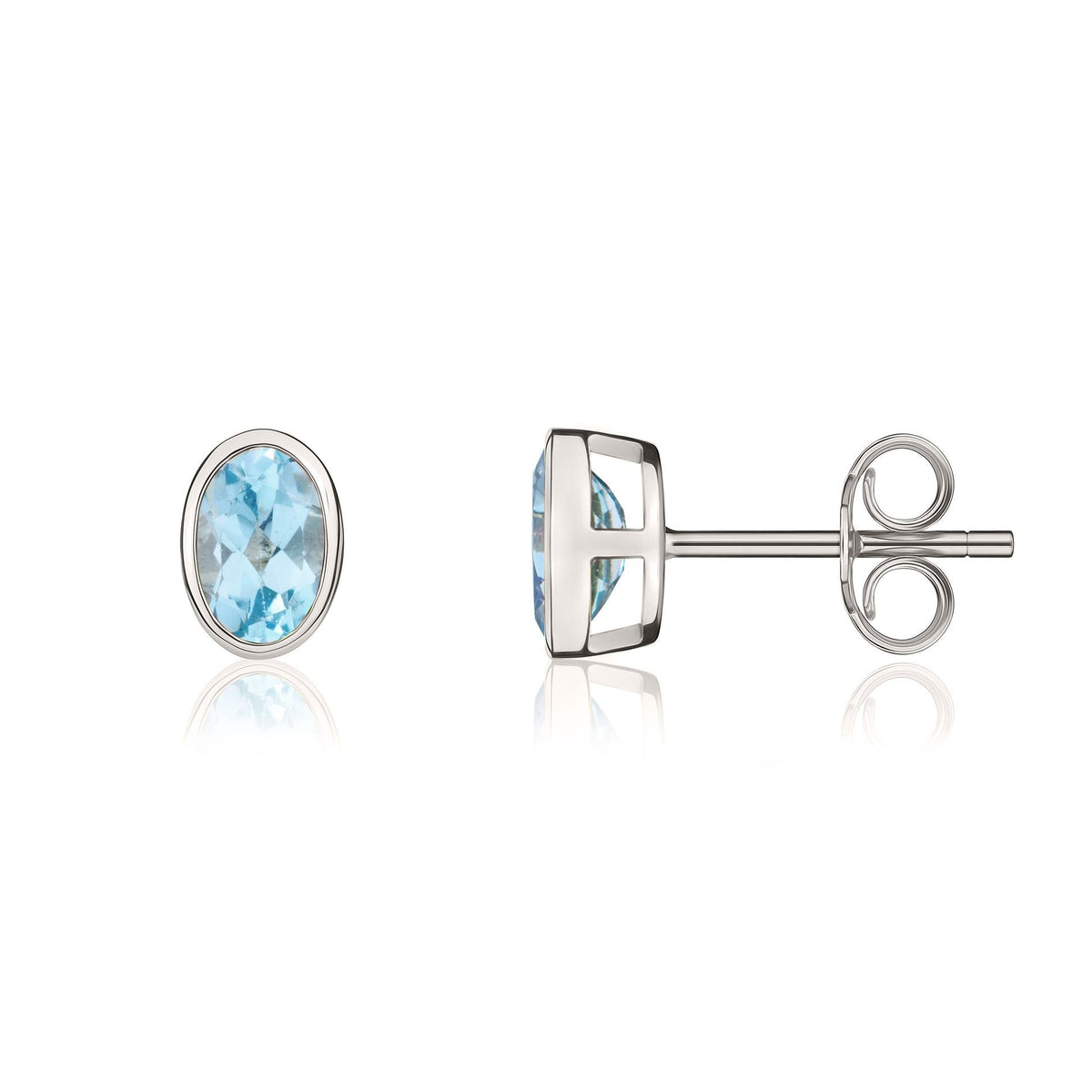 9ct White Gold Oval Natural Swiss Blue Topaz Rubover Stud Earrings — 6x4mm