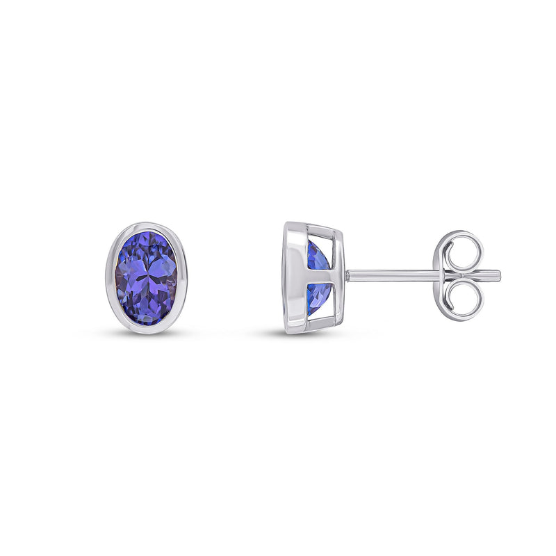 9ct White Gold Oval Natural Tanzanite Rubover Stud Earrings — 6x4mm
