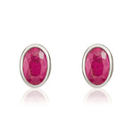 9ct White Gold Oval Natural Ruby Rubover Stud Earrings — 6x4mm