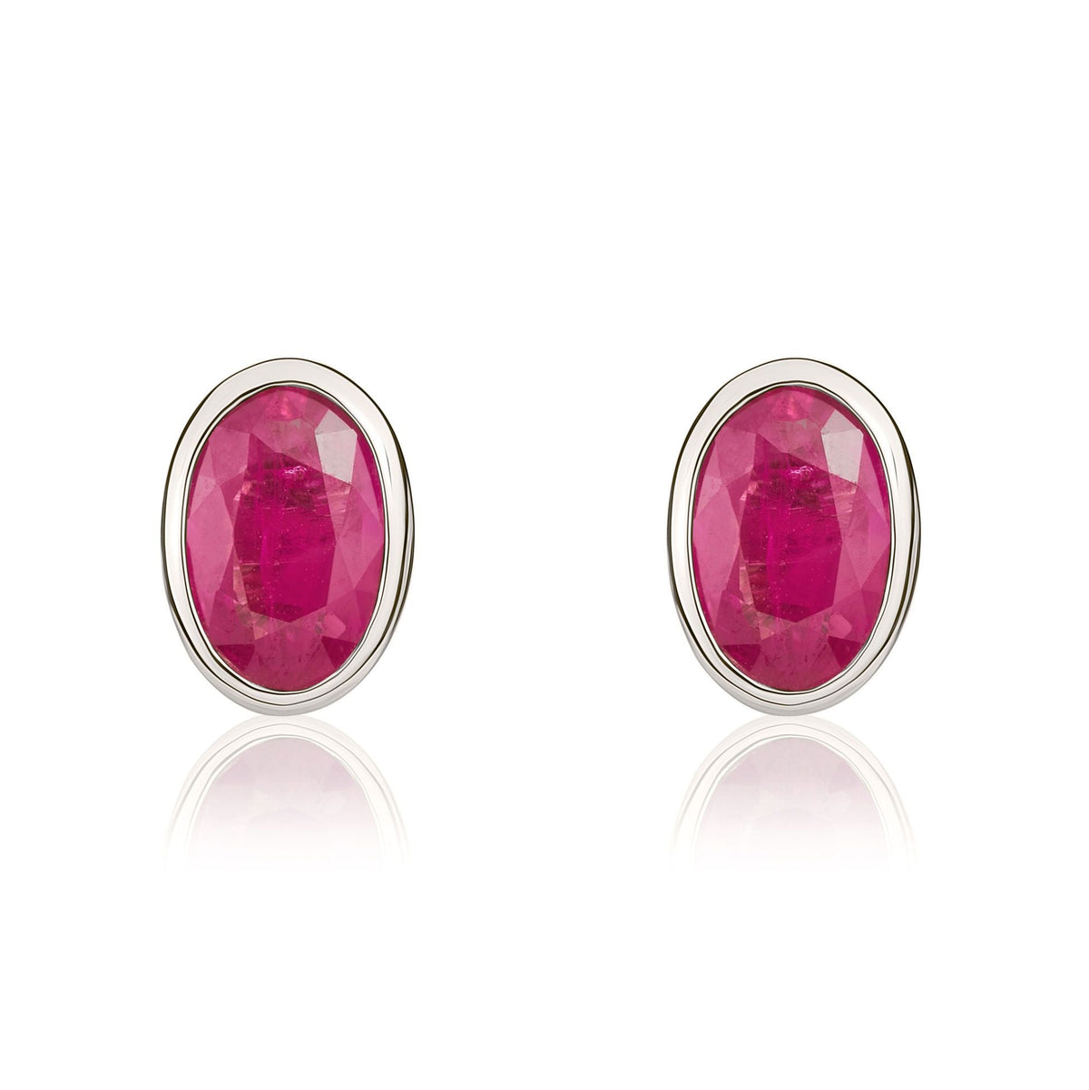 9ct White Gold Oval Natural Ruby Rubover Stud Earrings — 6x4mm