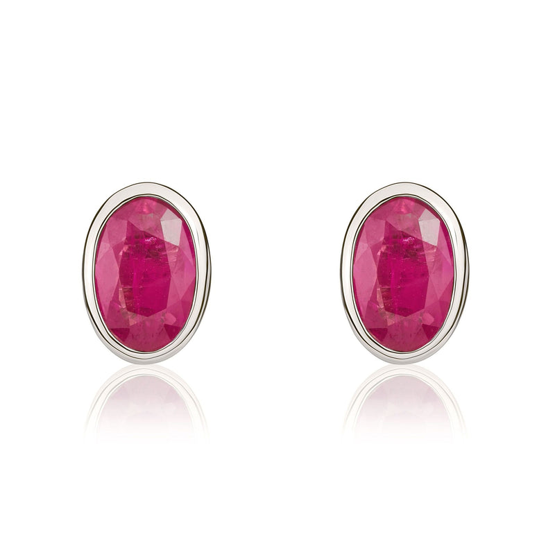 9ct White Gold Oval Natural Ruby Rubover Stud Earrings — 6x4mm