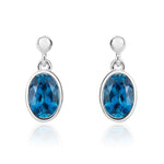 9ct White Gold Oval Natural London Blue Topaz Rubover Drop Earrings — 7x5mm