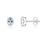 9ct White Gold Oval Natural Aquamarine Rubover Stud Earrings — 6x4mm
