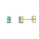 9ct Yellow Gold Oval Natural Swiss Blue Topaz Claw Stud Earrings — 5x3mm