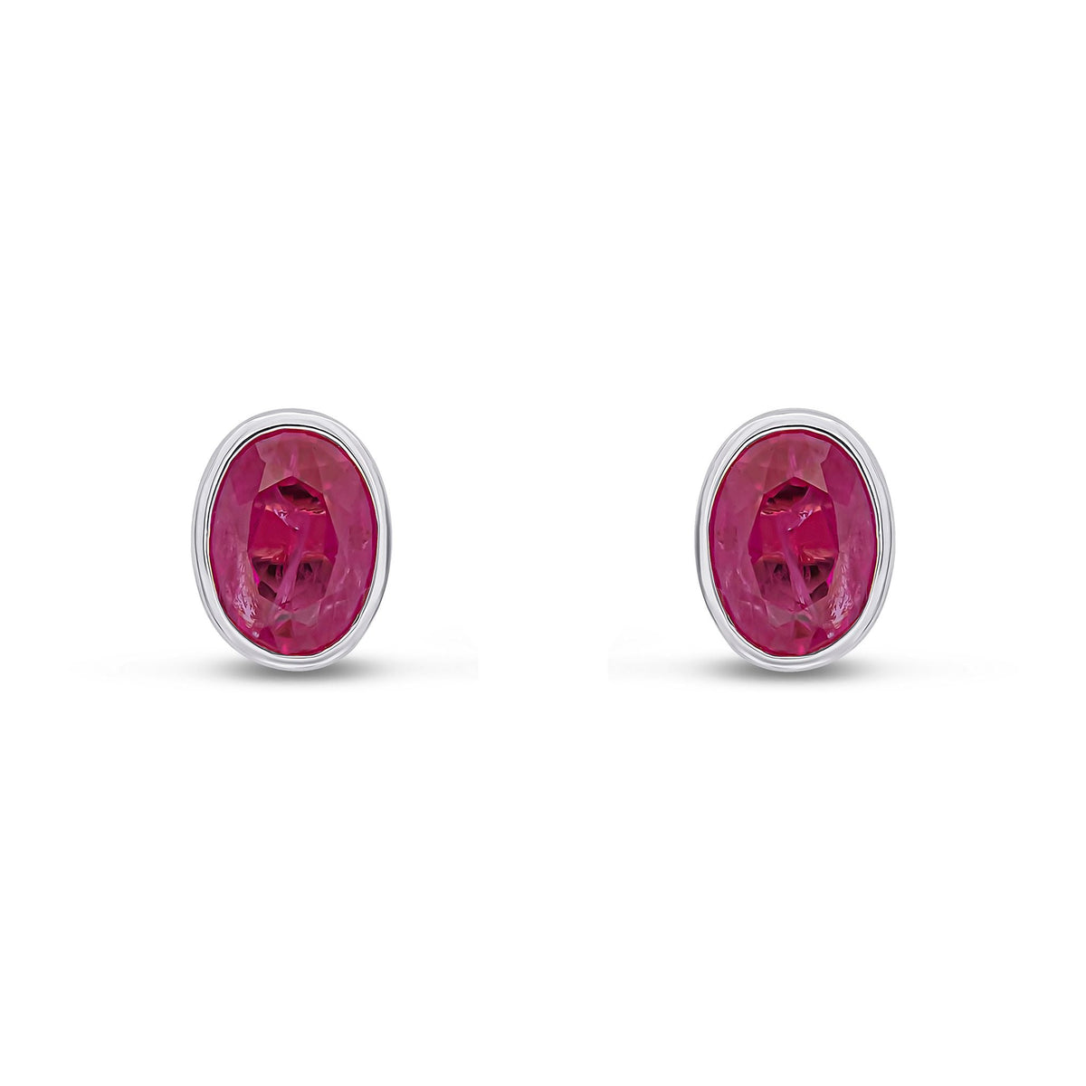 9ct White Gold Oval Natural Ruby Rubover Stud Earrings — 7x5mm