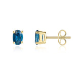 9ct Yellow Gold Oval Natural London Blue Topaz Claw Stud Earrings — 6x4mm