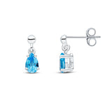 9ct White Gold Pear Shaped Natural Swiss Blue Topaz Claw Drop Earrings — 6x4mm