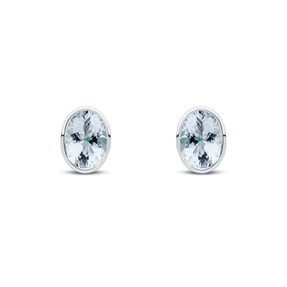 9ct White Gold Oval Natural Aquamarine Rubover Stud Earrings — 7x5mm