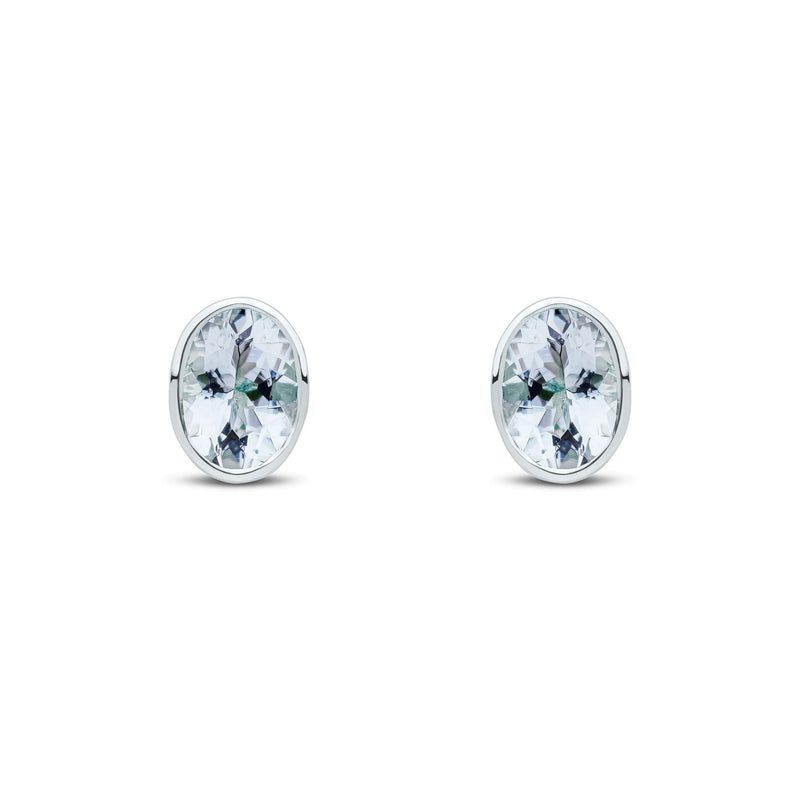 9ct White Gold Oval Natural Aquamarine Rubover Stud Earrings — 7x5mm